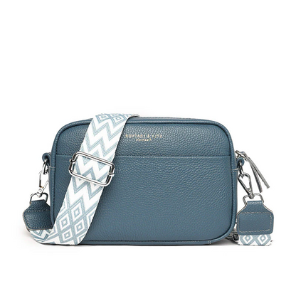 Durable genuine leather handbag bottom with protective feet, a luxury everyday tote for women.