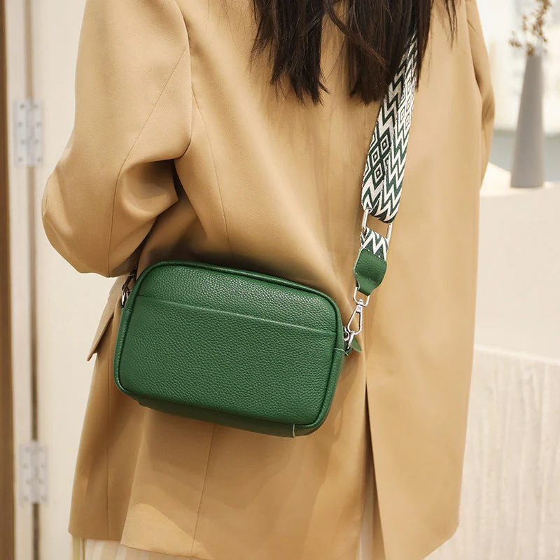 Durable cowhide leather crossbody bag, a versatile women's fashion accessory for daily use.