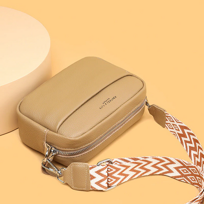 Spacious women's genuine leather tote bag, ideal for everyday carry of essentials.