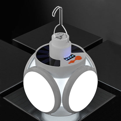 Unique geometric LED lamp, sculptural polygon design, emits warm accent light, elegant decor