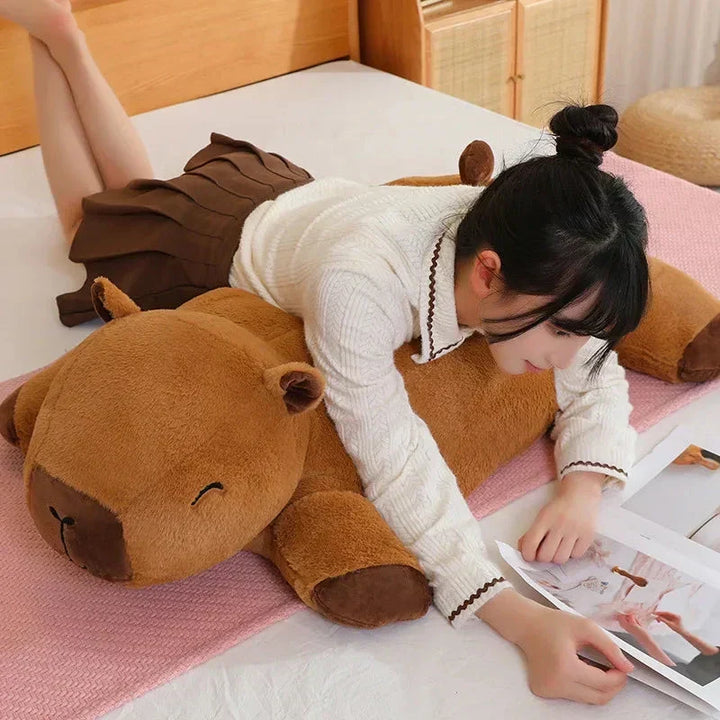 Large cuddly capybara plush toy, a giant snuggle companion perfect for kids & adults.