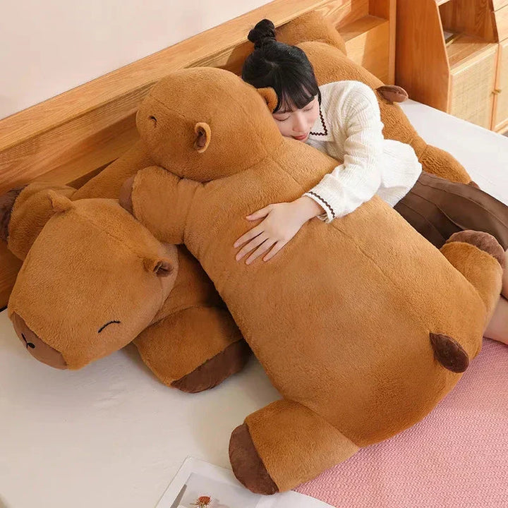 Detailed brown giant capybara plushie, friendly face, a soft cuddly animal snuggle toy.