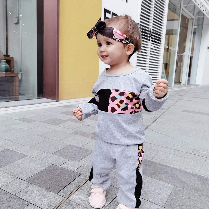 Practical toddler girl outfit: warm knit sweater & durable play pants.