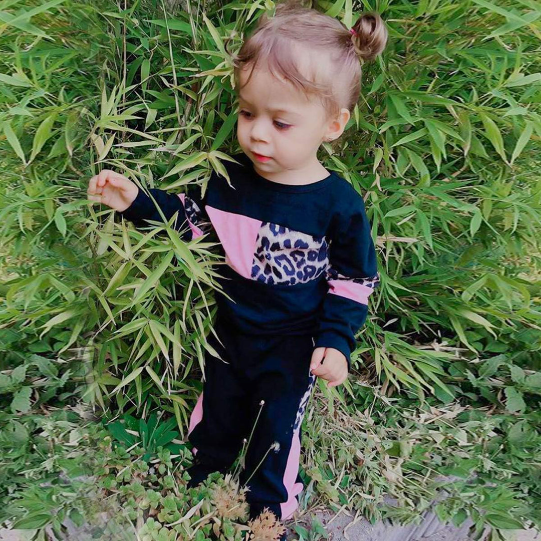 Girls' comfortable winter clothing: soft sweater & matching pants set.