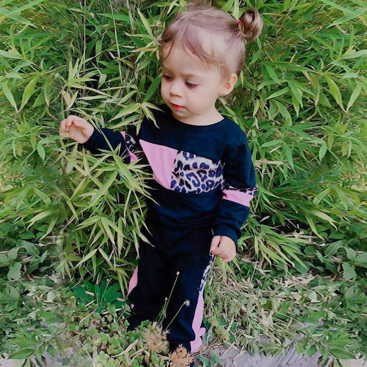 Girls' comfortable winter clothing: soft sweater & matching pants set.