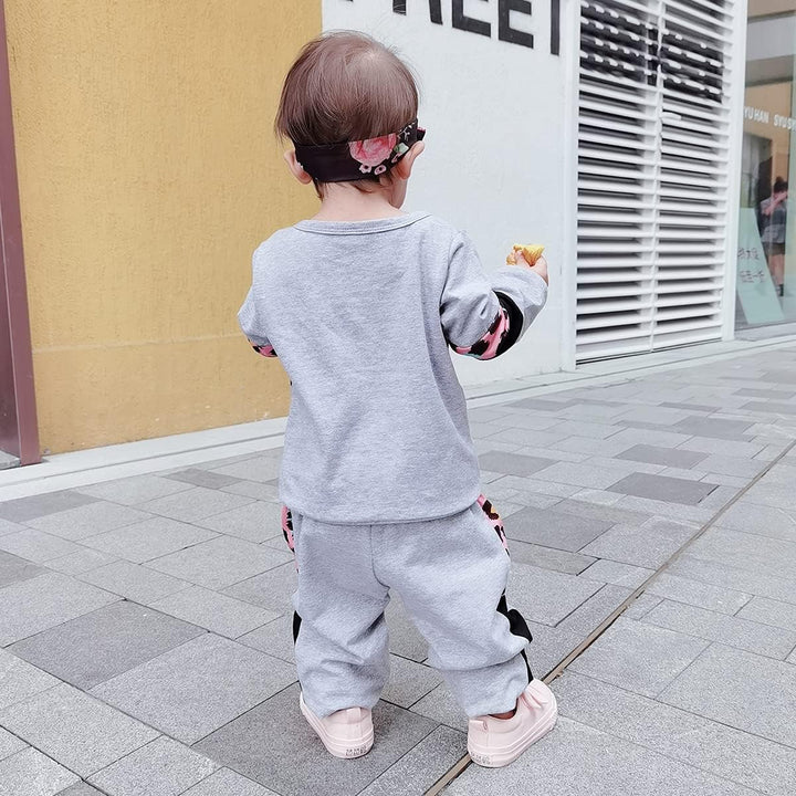 Girls' complete playwear set: warm sweater & durable pants for endless fun.