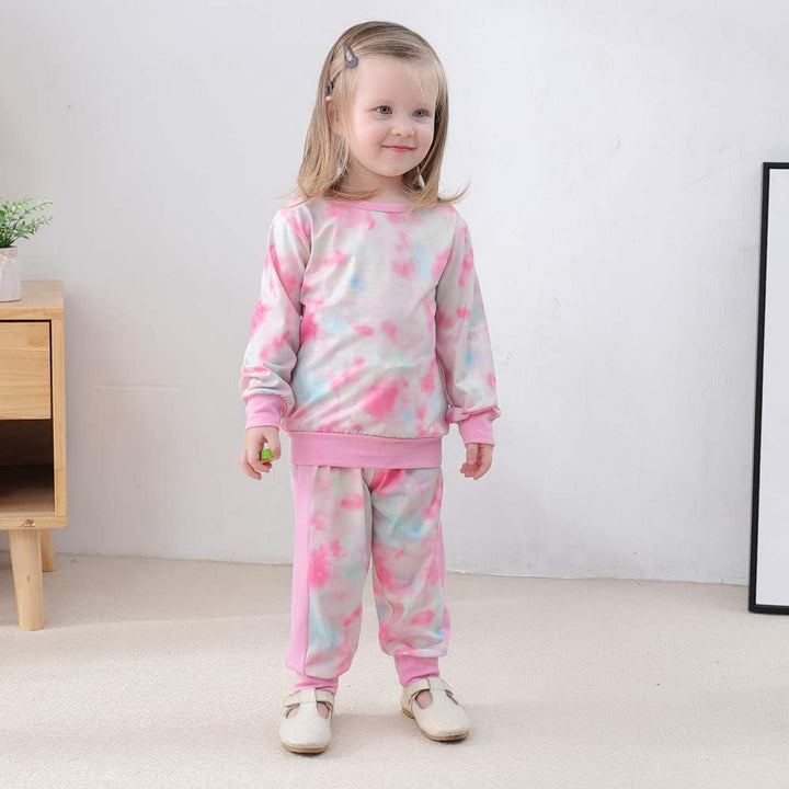 Little girl's winter clothing: snug sweater & matching play pants, toddler set.