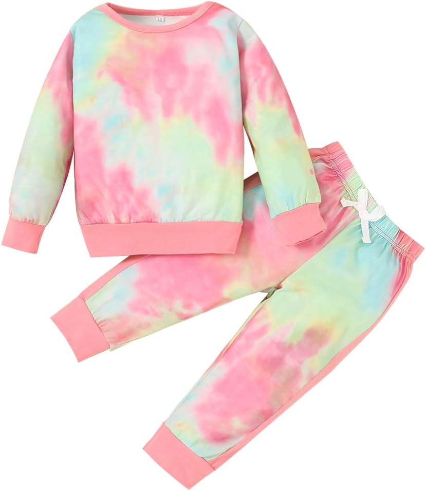 Little girl's essential winter clothing: snug sweater & matching play pants.