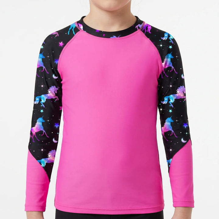 Stylish girls' long-sleeve rash guard, offering sun protection & comfort for summer water fun and beach days.