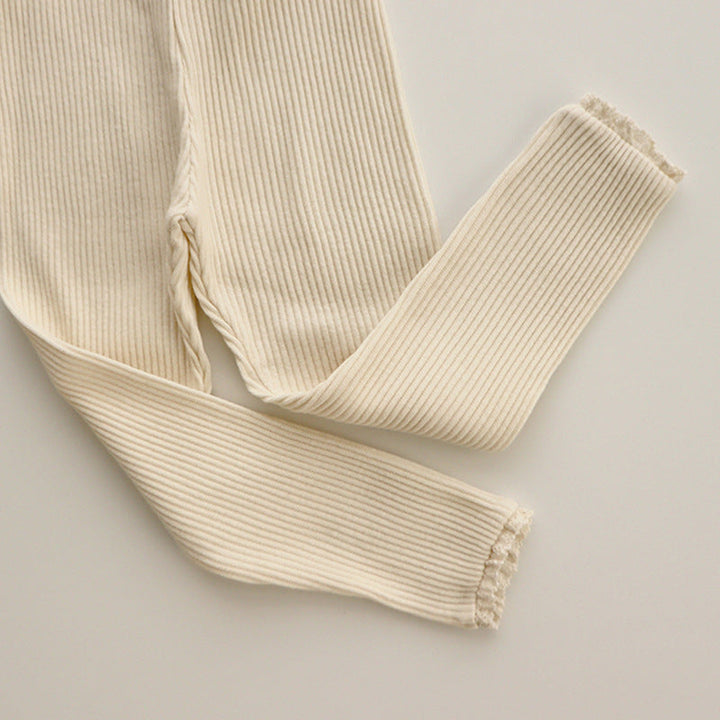 Cute baby girl ribbed leggings with elegant lace trim, perfect toddler fashion for stylish outfits.