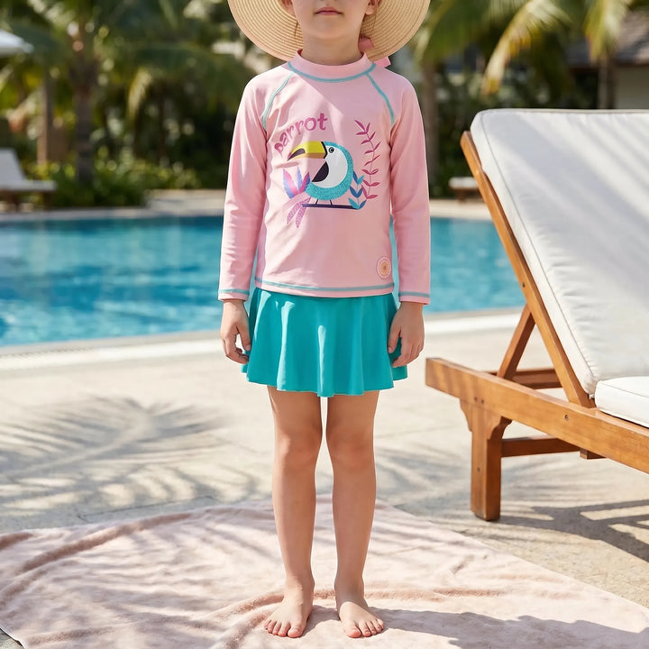 Girls' vibrant long-sleeve rash guard swimsuit set with UPF 50+ sun protection, perfect for beach & pool.