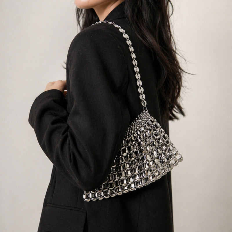 Sparkling mirrored mesh women's evening bag with shoulder strap. A glamorous accessory for any special occasion.