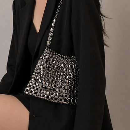 Elegant mirrored mesh evening bag, a versatile shoulder bag or clutch for women. Adds glamour to any party outfit.