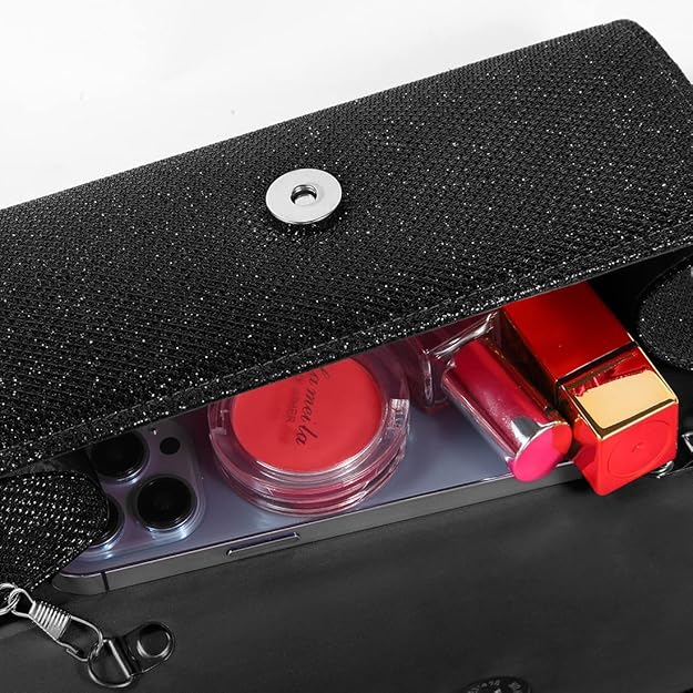 Detailed view of women's sparkle evening clutch handbag with secure closure. Glitter fashion accessory.