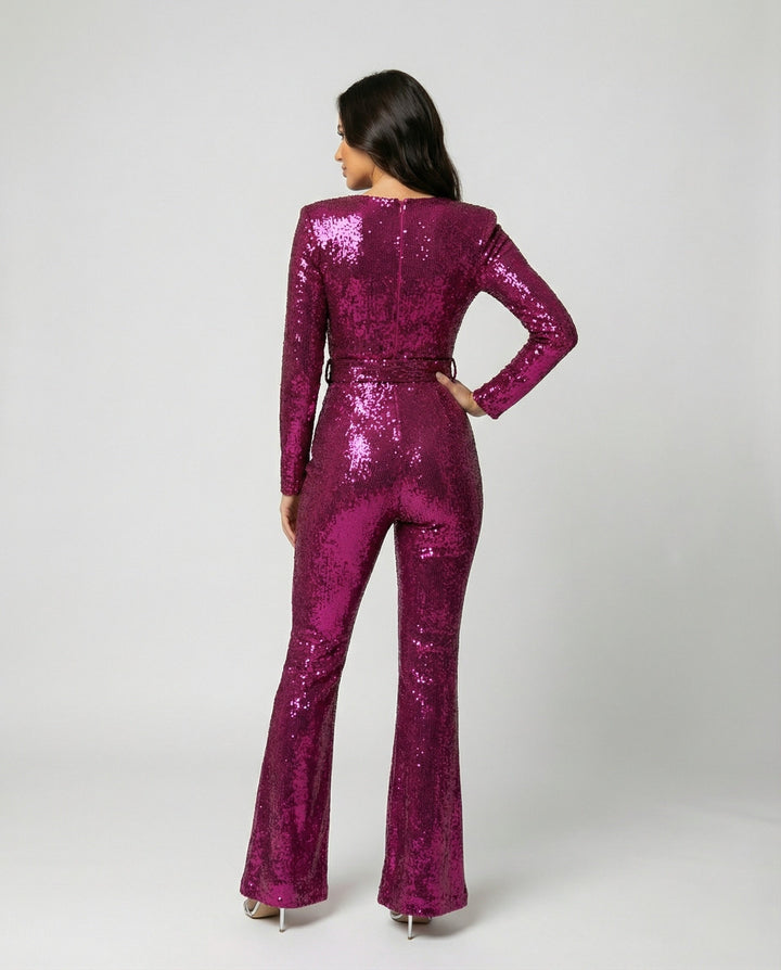 Sparkling women's sequin jumpsuit, long sleeve formal wear. Ideal glamorous outfit for special events.