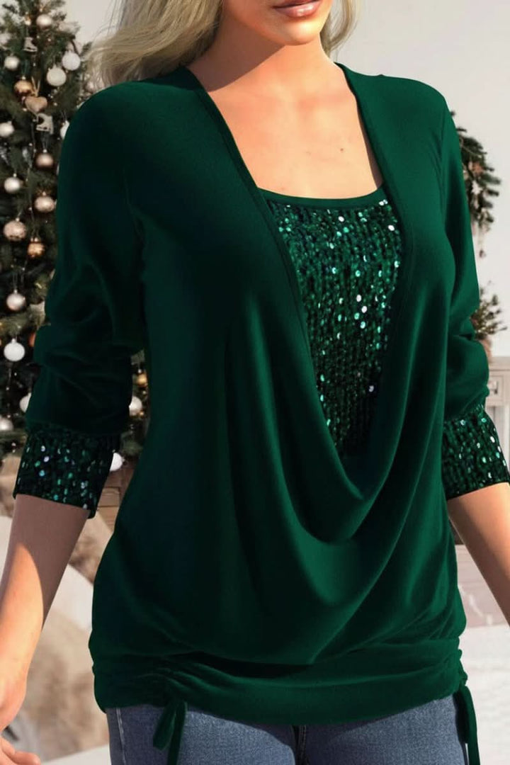 Women's statement sequin top with a bold plunging neckline & long sleeves. Glamorous evening & party wear.