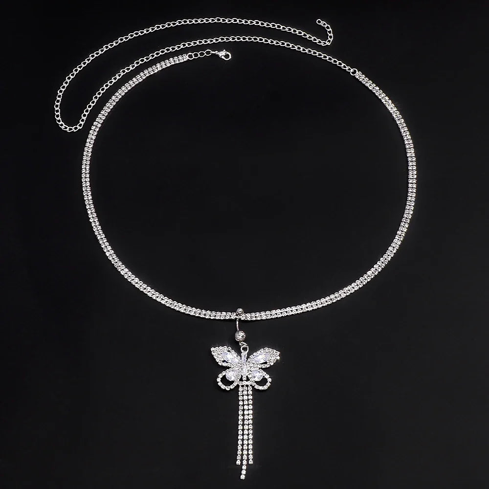 Elegant women's rhinestone butterfly body chain. A glamorous accessory adding sparkle to any outfit.