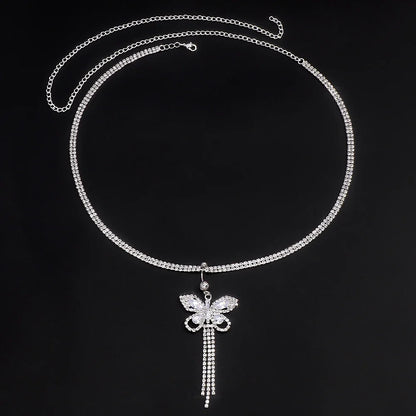 Elegant women's rhinestone butterfly body chain. A glamorous accessory adding sparkle to any outfit.