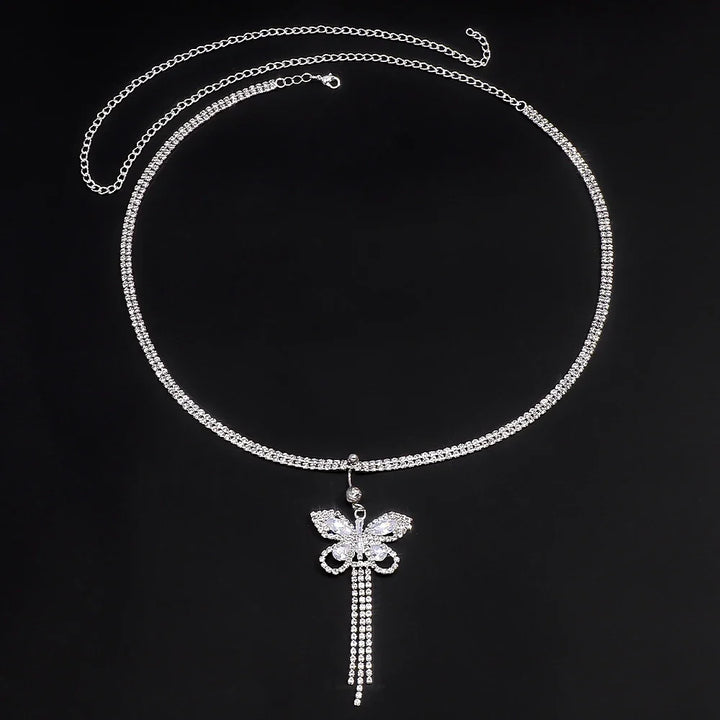 Elegant women's rhinestone butterfly body chain. A glamorous accessory adding sparkle to any outfit.