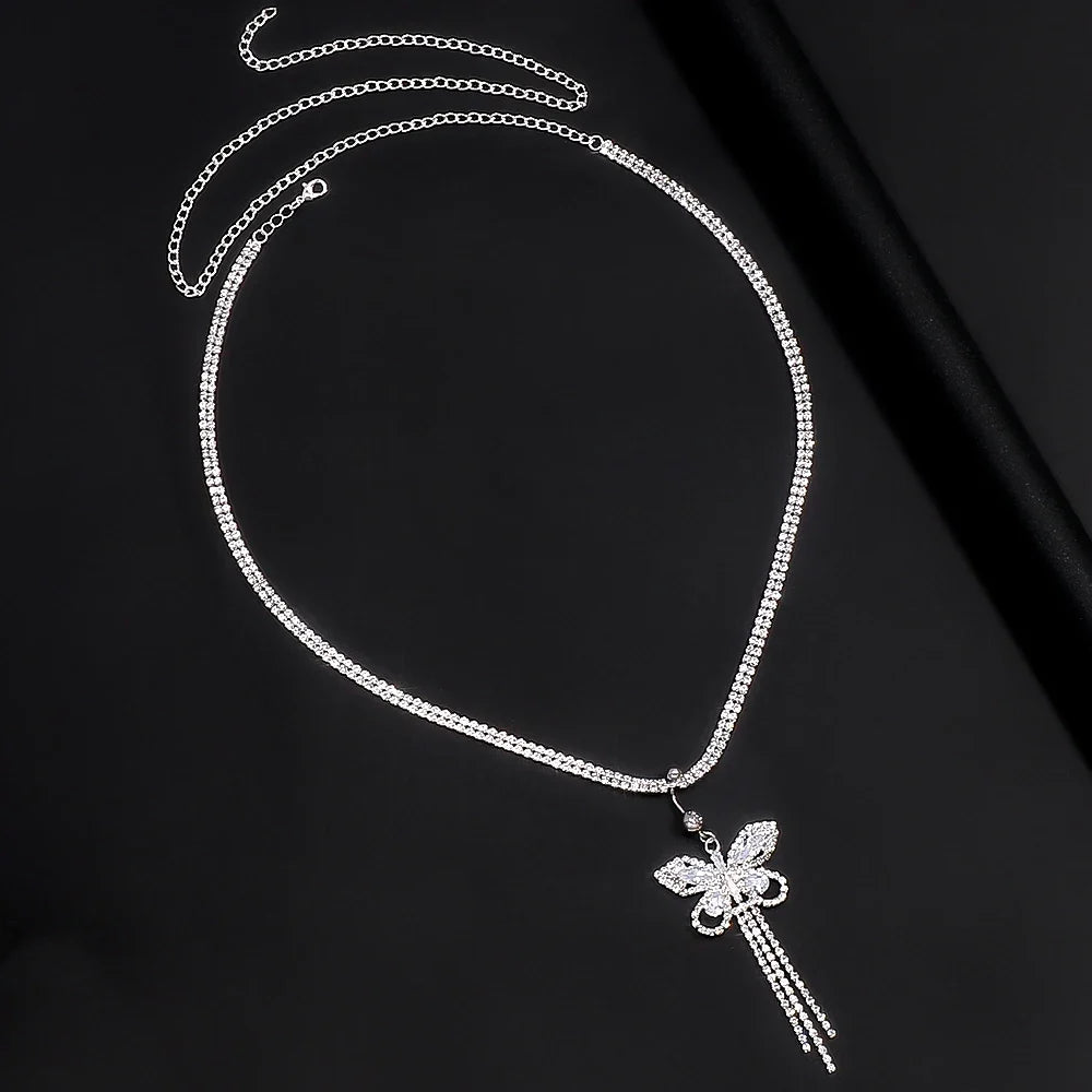Women's dazzling butterfly body chain with intricate rhinestone design. Perfect for beach & festival glam.