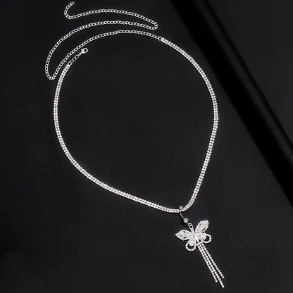 Women's dazzling butterfly body chain with intricate rhinestone design. Perfect for beach & festival glam.