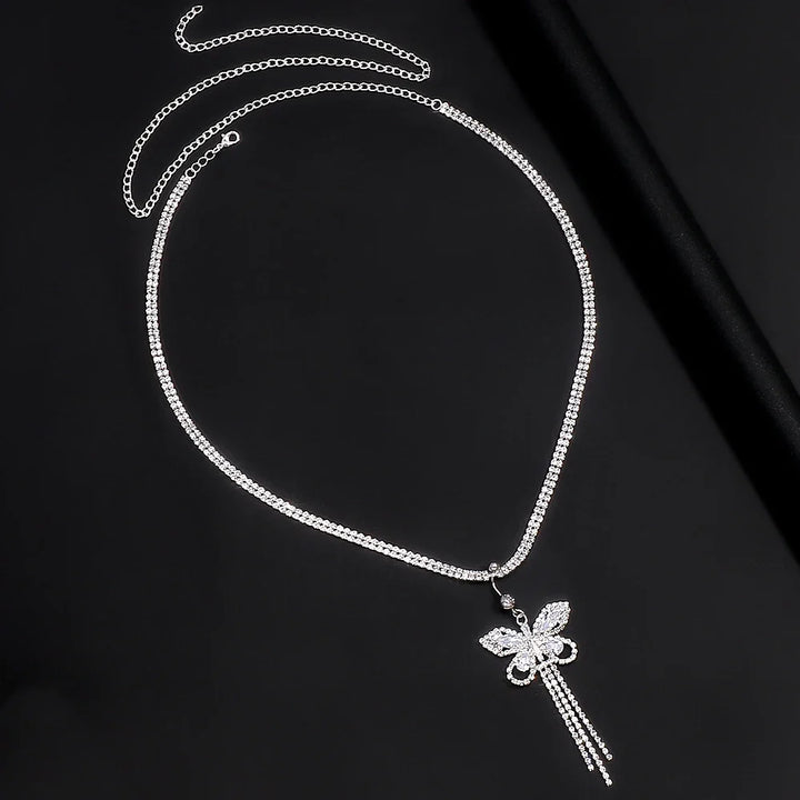 Women's dazzling butterfly body chain with intricate rhinestone design. Perfect for beach & festival glam.