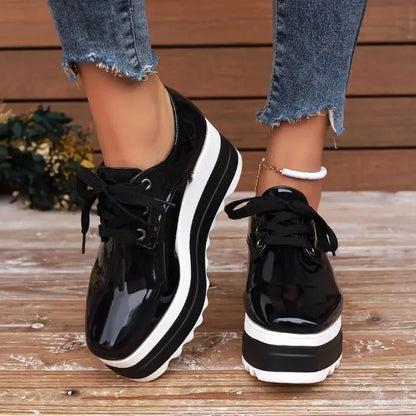 Stylish women's glossy lace-up platform sneakers, combining modern fashion with superior comfort.