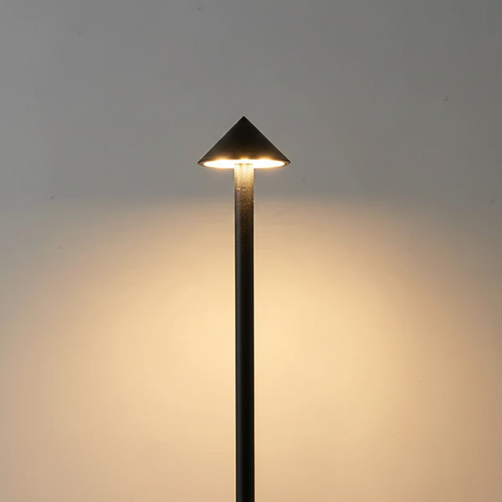 Unisex portable LED table lamp, a modern design accent for ambient and mood lighting in living spaces.