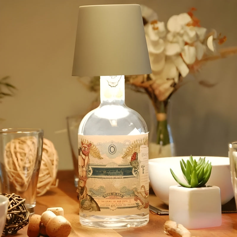 Stylish GlowBottle table lamp provides soft ambient light, enhancing your living room or bedroom decor.