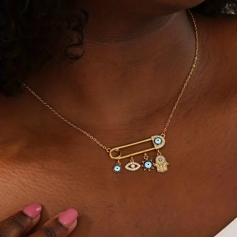 Elegant women's protective Evil Eye necklace, a chic gold plated jewelry piece with detailed zircon.