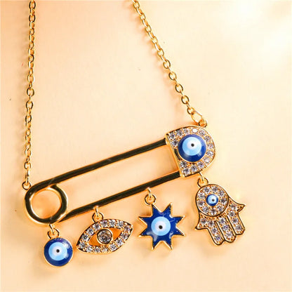 Stylish women's jewelry: Gold plated Evil Eye pendant necklace, a symbol of protection and modern fashion.