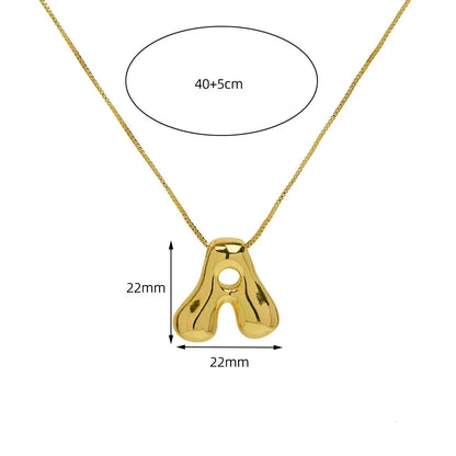 Modern Golden Pop initial pendant necklace for women, a sleek gold-tone stainless steel letter for personalized style.