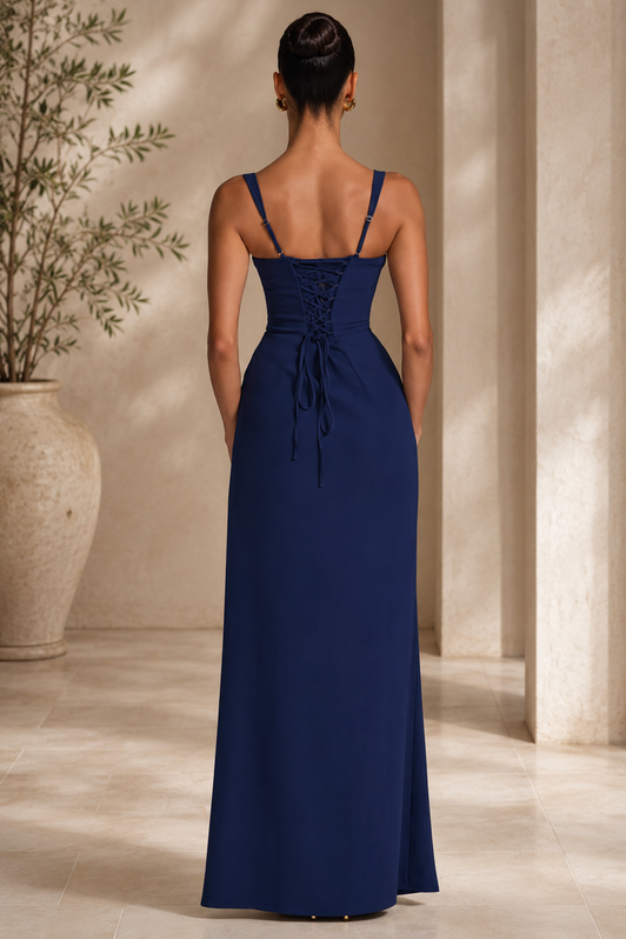 Beautiful women's navy blue party dress, a graceful flowing maxi gown for elegant evening wear.