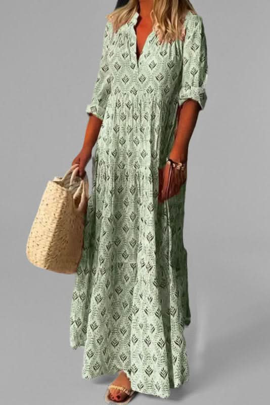 Chic grey tiered maxi dress for women. Effortless flowing style, ideal for summer or casual wear.