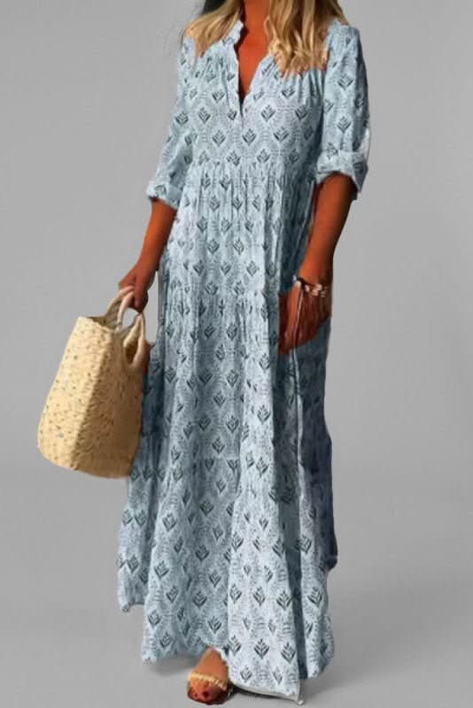 Green tiered maxi dress for women. Light, flowing fabric and elegant style for summer casual occasions.