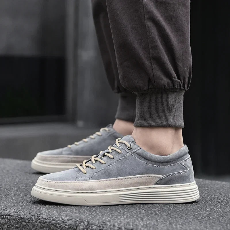 Premium gray suede men's Garrison sneakers, stylish leather footwear for ultimate everyday comfort.