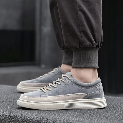 Premium gray suede men's Garrison sneakers, stylish leather footwear for ultimate everyday comfort.