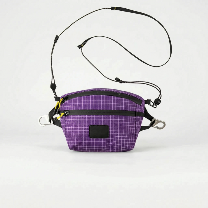 Modern gray grid pattern sling bag, a unisex cross chest fanny pack for daily essentials.