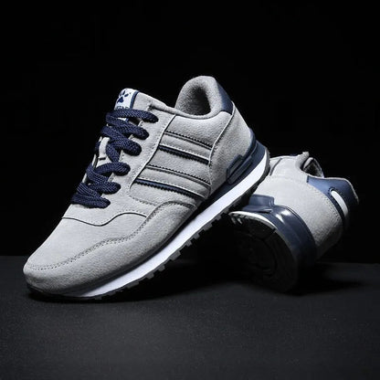 Gray women's comfort walking sneakers with lace-up closure. Ideal for everyday wear, cushioned and breathable.