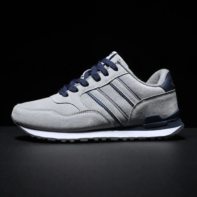 Blue women's athletic walking shoes, lightweight and comfortable for casual everyday wear. Lace-up design.