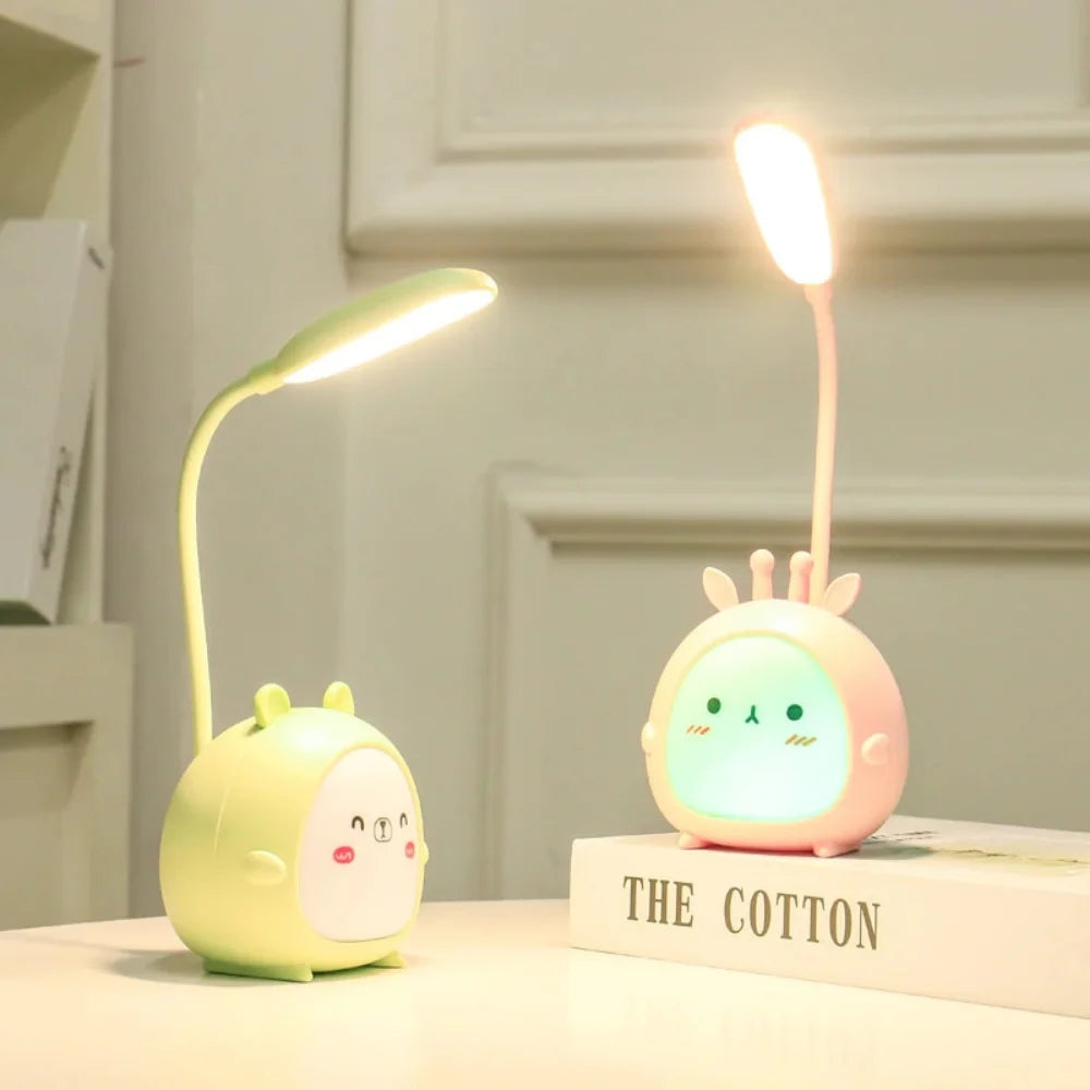 Green deer children's eye-care reading lamp with USB night light for kids' study desk.