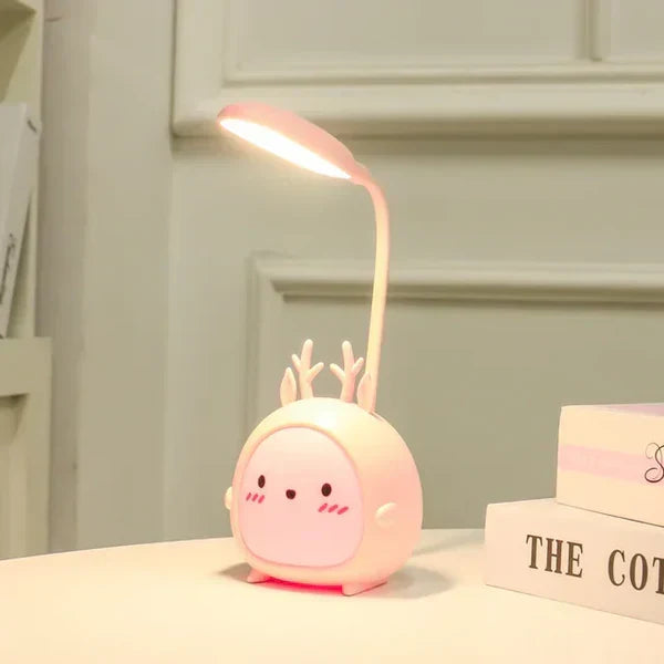 Portable children's eye-care reading lamp, deer design, USB night light for kids' bedroom.