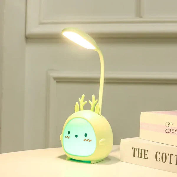 USB rechargeable eye protection desk lamp for children, cute deer design, ideal for reading.