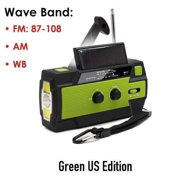 Survival gear: green emergency radio, power bank, and LED flashlight for reliable outdoor use.