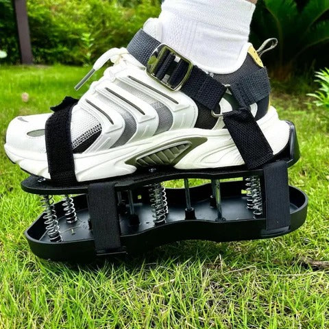 Pair of easy-to-use lawn aerator shoes, a key garden tool for improved soil health and a lush, greener yard.