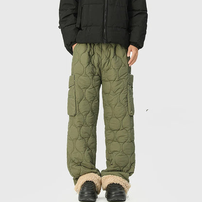 Black men's quilted winter pants, insulated & cozy, ideal for outdoor gear & casual cold weather wear.