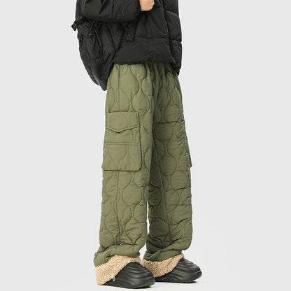 Relaxed fit men's insulated quilted trousers with adjustable cuffs, offering ultimate winter comfort & warmth.
