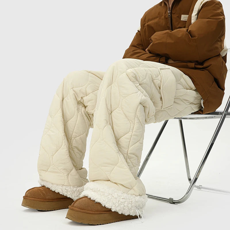 Durable men's quilted winter pants, insulated for cold weather outdoor activities and casual wear.