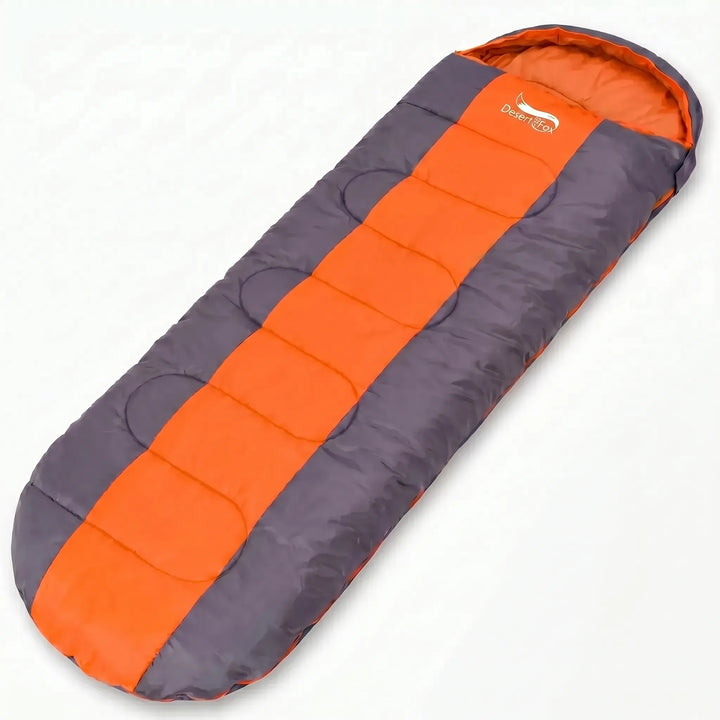 Warm 4-season envelope sleeping bag in green & orange, perfect for cold weather camping & outdoor adventures.