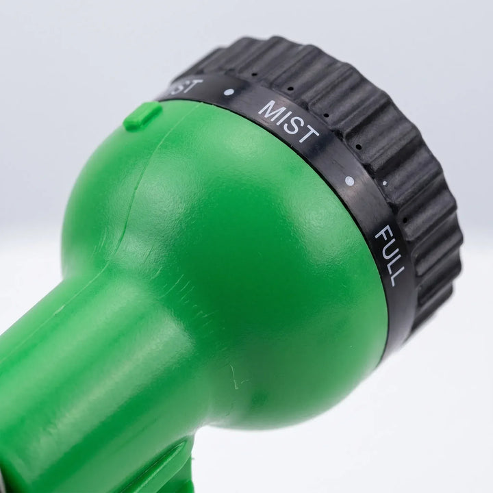 Flexible coiled garden hose for car cleaning, yard care & outdoor watering. Tangle-free design ensures easy handling.